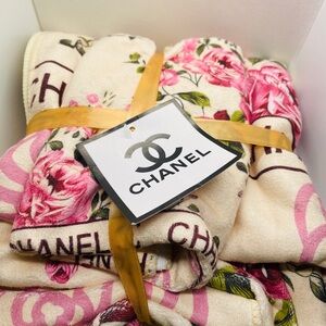 Set of two CHANEL Pink and Cream Floral bath and hand towel